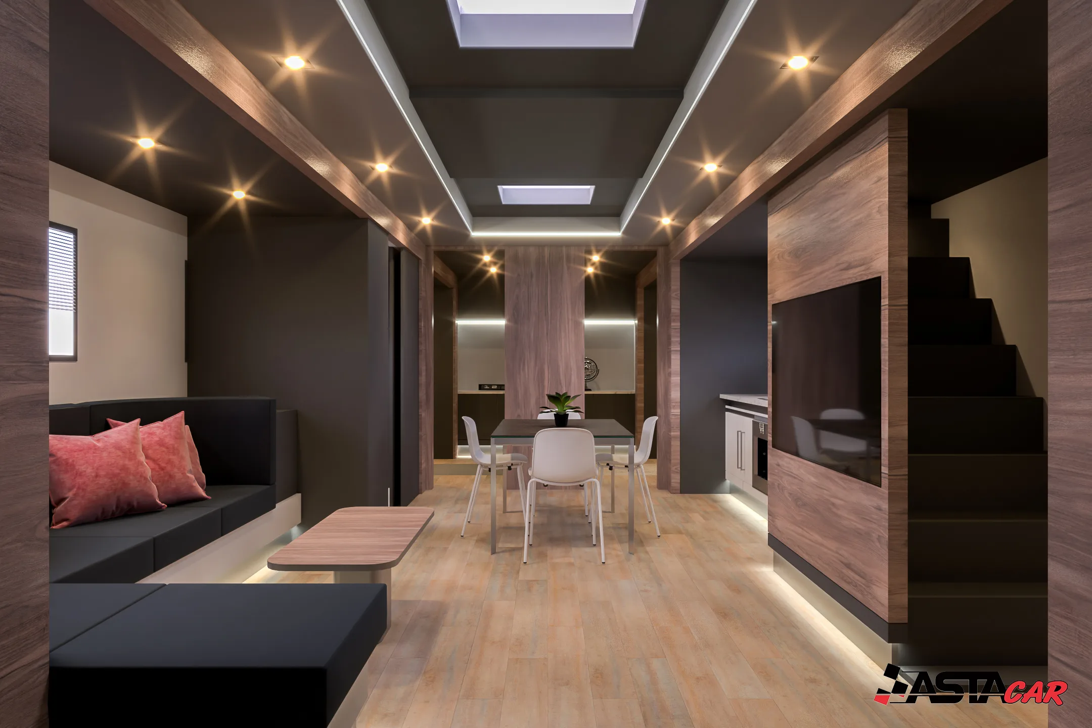 Soggiorno del semirimorchio living con divano, zona pranzo e scala
